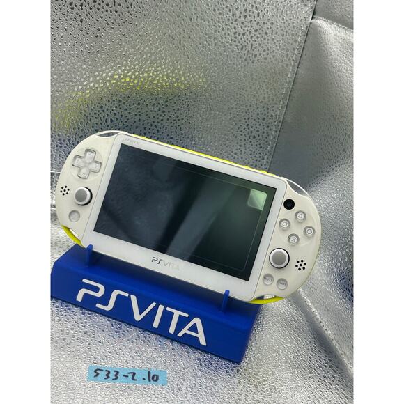 white/yellow with a dash of light blue ps vita 2000 w/charger - Picture 6 of 8